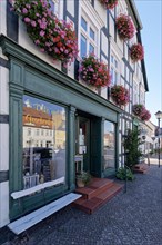Half-timbered house decorated with flower boxes on the market square of the Hanseatic town of Werben in the Altmark region. Werben
