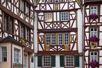 Facades of gabled half-timbered houses on the medieval market square