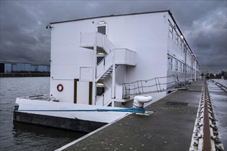 Arrival of pontoon De Reno in the Ghent port. Former floating prison from the Netherlands will now be used to accommodate up to 250 asylum seekers at the Rigakaai dock in the harbour of Ghent