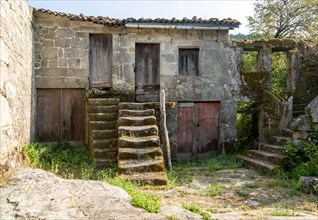 Abandoned old buildings in village of Pazos de Arenteiro