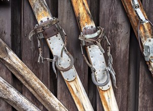 Old wooden skis with spring binding