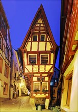 Pointe house on the medieval market square in the evening