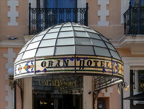 Stained glass canopy entrance to Gran Hotel