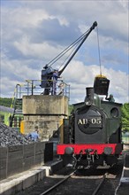 Crane loading coal as fuel for steam train at the depot of the Chemin de Fer a Vapeur des Trois Vallees at Mariembourg