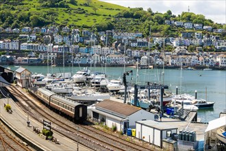 View across Kingswear railway station and River Dart estuary to Dartmouth