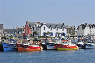 Colourful trawler fishing boats in the Guilvinec port