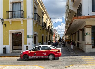 Taxi car on street in historic centre of Campeche city