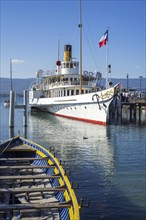 Swiss historic Belle Epoque paddle steamboat Savoie in the old port at Yvoire along Lake Geneva