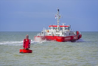 Red buoy in the North Sea and the Westerschelde