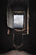 Room with window seat in recess inside medieval Beersel Castle