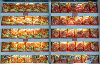 Display rows in shop of packets of Cheetos crips