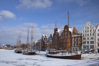 Sailing ship in the snow in winter in the harbour museum at the Hanseatic City of Luebeck
