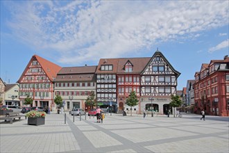 Left Building Thurn- und Taxissche Post built 1550 and historic half-timbered houses