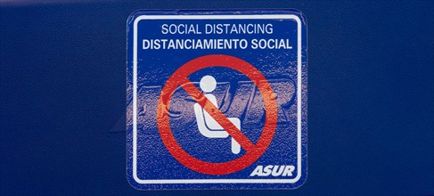Social distancing sign in seating area