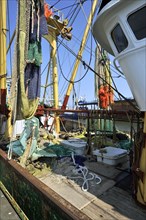 Dragnets on board of trawler fishing boat in the harbour of Oudeschild
