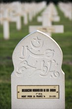 Muslim stele among French graves on the First World War One cemetery Cimetiere National Francais de Saint-Charles de Potyze near Ypres