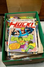 Box of The Incredible Hulk comics on display in auction room