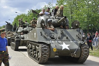Second World War collectors on M4 Sherman battle tank during parade at the open day of the Belgian army at Leopoldsburg