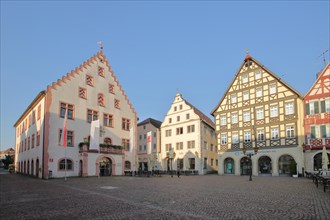 Town hall built 1564 with stepped gable and historic houses