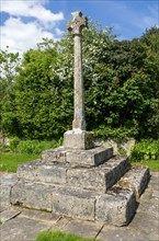 Cross monument on village green