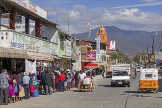 Street with market stalls in the city Tlacolula de Matamoros