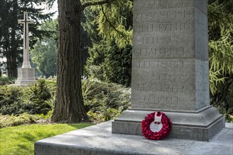WWI German stele and British Cross of Sacrifice at the St Symphorien Commonwealth War Graves Commission cemetery at Saint-Symphorien near Mons