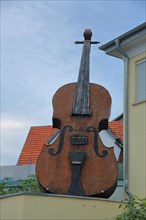 Large violin for decoration and advertising music