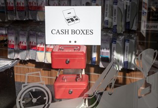 Display of Cash Boxes on sale in hardware shop window