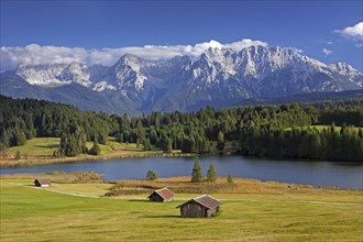 The Karwendel Mountain Range and huts along lake Gerold