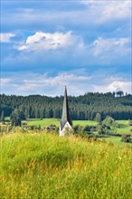 Church tower of the Catholic parish church Stankt Pelagius in the municipality of Weitnau in Oberallgaeu
