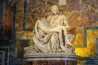 Marble sculpture Sculpture of white marble from Carrara in warm light Pieta by Michelangelo Mary Mother of God mourns holds son