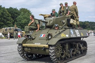 Free French M3A3 Stuart tank during WW2 military vehicles parade at Wold War Two militaria fair