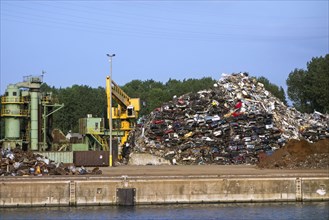 Scrapheap of recycled metal from dismantled cars at Van Heyghen Recycling export terminal