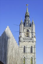 Medieval belfry tower and modern Gentse Stadshal
