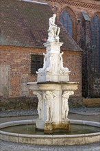 The Neptune Fountain in front of St. Nikolai's Church in Osterburg