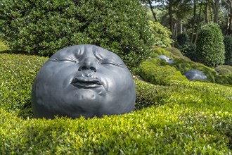 Giant Faces in the Garden of Emotions Jardin Emotions