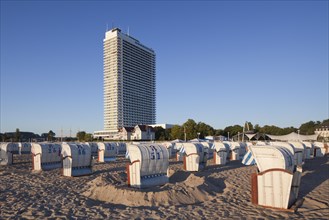 The Maritim Hotel and roofed wicker beach chairs at Travemuende