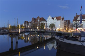 Museums harbour with traditional sailing ships berthed at the Untertrave in the Hanseatic town Luebeck
