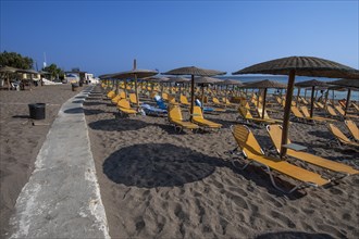 Sun loungers and parasols without end at Rhodes Town beach