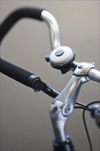Close up of bike bell mounted on trekking bars