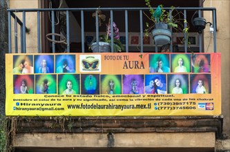 Sign advertising poster for aura photos
