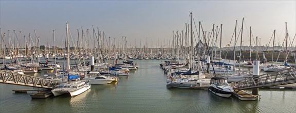Yachts and sailing boats at the yacht-basin