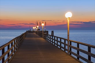 Illuminated wooden pier