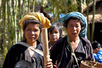 Women in traditional dress in the village
