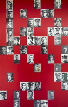 Photo wall showing perished soldiers in visitor centre of the Lijssenthoek Military Cemetery