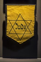 German Jewish badge showing yellow star saying Jude