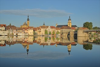View of townscape on the Main with St. Johannes church and town church and historic Old Main Bridge