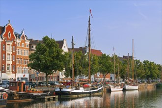 Museums harbour with traditional sailing ships berthed at the Untertrave in the Hanseatic town Luebeck