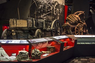 Old wooden cart and First World War One weapons and findings at the In Flanders Fields Museum
