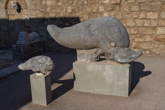 Dolphin with child as grave decoration